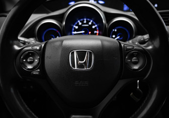 Подержанный автомобиль Honda Civic Hatchback 2013 года (10 фото)