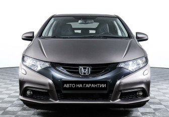 Подержанный автомобиль Honda Civic Hatchback 2013 года (2 фото)