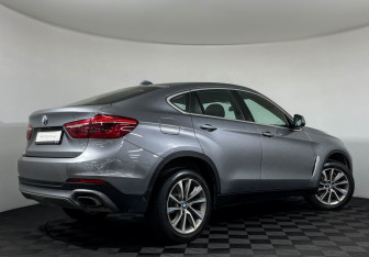 Подержанный автомобиль BMW X6 2018 года (2 фото)