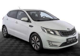 Подержанный автомобиль Kia Rio Hatchback 2014 года (3 фото)