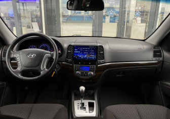 Подержанный автомобиль Hyundai Santa Fe 2012 года (11 фото)