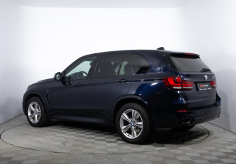 Подержанный автомобиль BMW X5 2014 года (7 фото)
