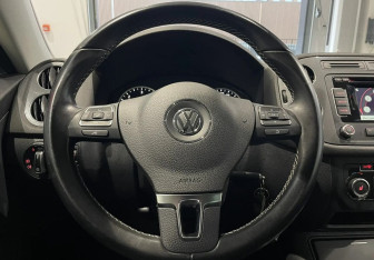 Подержанный автомобиль Volkswagen Tiguan 2014 года (14 фото)