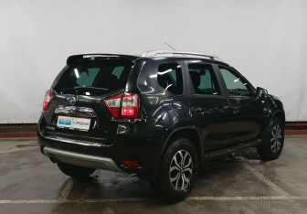 Подержанный автомобиль Nissan Terrano 2014 года (5 фото)