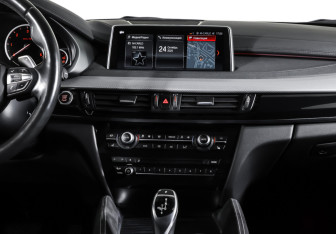 Подержанный автомобиль BMW X6 2018 года (14 фото)