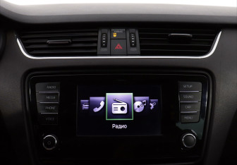 Подержанный автомобиль Skoda Octavia Wagon 2014 года (14 фото)