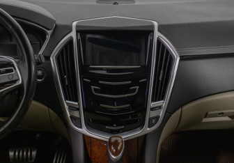 Подержанный автомобиль Cadillac SRX 2013 года (14 фото)