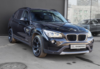 Подержанный автомобиль BMW X1 2014 года (3 фото)