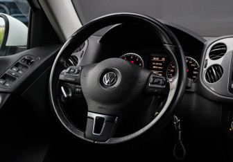 Подержанный автомобиль Volkswagen Tiguan 2014 года (11 фото)