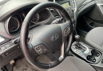 Подержанный автомобиль Hyundai Santa Fe 2013 года (14 фото)