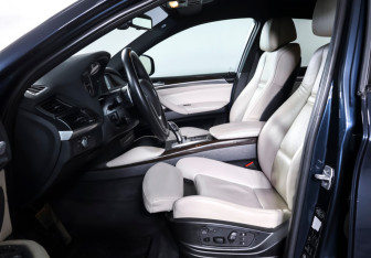 Подержанный автомобиль BMW X6 2013 года (15 фото)