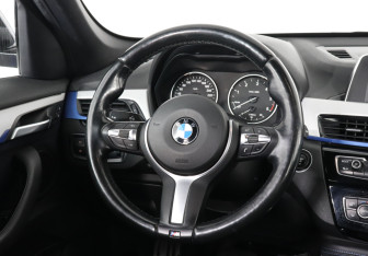 Подержанный автомобиль BMW X1 2016 года (12 фото)