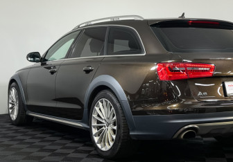 Подержанный автомобиль Audi A6 allroad 2014 года (22 фото)