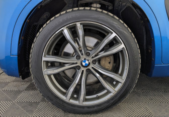 Подержанный автомобиль BMW X6 2018 года (12 фото)