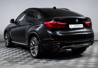 Подержанный автомобиль BMW X6 2017 года (7 фото)