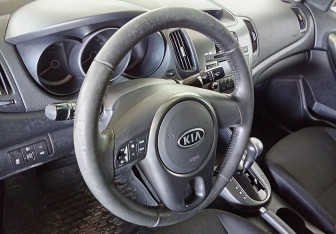 Подержанный автомобиль Kia Cerato Sedan 2009 года (12 фото)