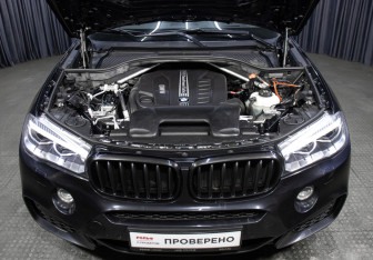 Подержанный автомобиль BMW X6 2017 года (9 фото)