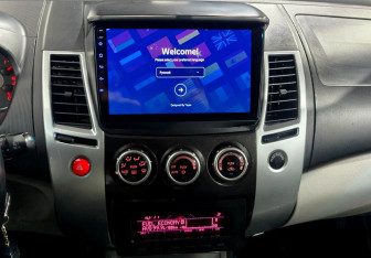 Подержанный автомобиль Mitsubishi Pajero Sport 2011 года (14 фото)