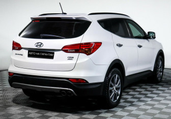 Подержанный автомобиль Hyundai Santa Fe 2014 года (3 фото)