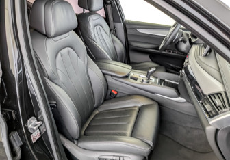 Подержанный автомобиль BMW X6 2018 года (24 фото)