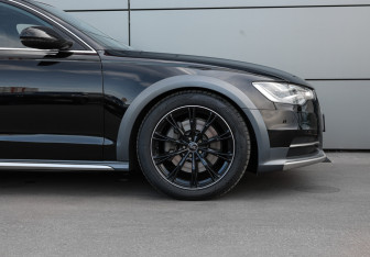 Подержанный автомобиль Audi A6 allroad 2014 года (27 фото)