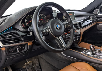 Подержанный автомобиль BMW X6 M 2016 года (16 фото)