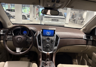 Подержанный автомобиль Cadillac SRX 2011 года (11 фото)