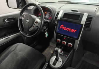Подержанный автомобиль Nissan X-Trail 2012 года (10 фото)