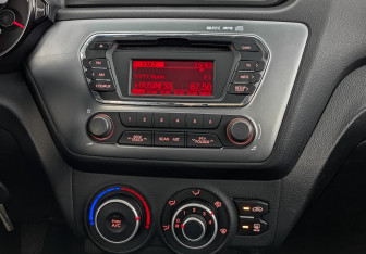 Подержанный автомобиль Kia Rio Sedan 2014 года (15 фото)