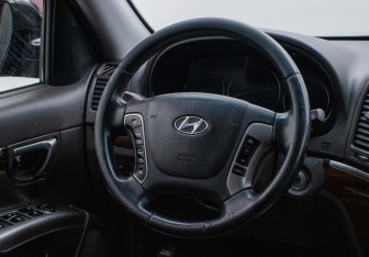Подержанный автомобиль Hyundai Santa Fe 2011 года (15 фото)