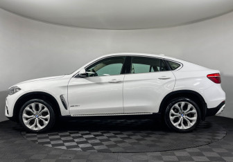 Подержанный автомобиль BMW X6 2015 года (5 фото)
