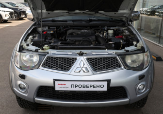 Подержанный автомобиль Mitsubishi L200 2012 года (9 фото)