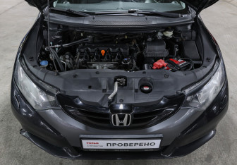 Подержанный автомобиль Honda Civic Hatchback 2012 года (7 фото)