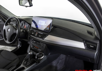 Подержанный автомобиль BMW X1 2013 года (9 фото)