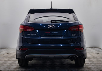 Подержанный автомобиль Hyundai Santa Fe 2015 года (4 фото)