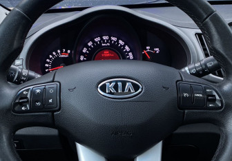 Подержанный автомобиль Kia Sportage 2012 года (18 фото)