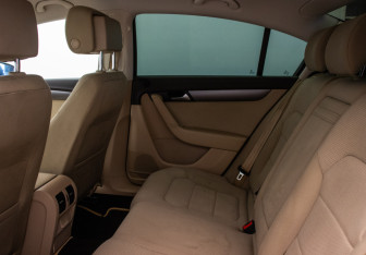 Подержанный автомобиль Volkswagen Passat Sedan 2011 года (10 фото)