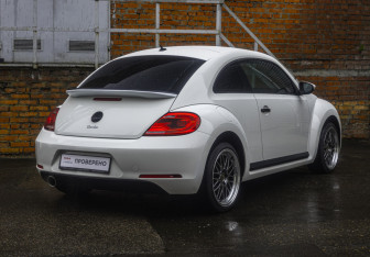 Подержанный автомобиль Volkswagen Beetle Hatchback 2013 года (7 фото)