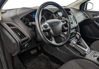 Подержанный автомобиль Ford Focus Hatchback 2014 года (15 фото)