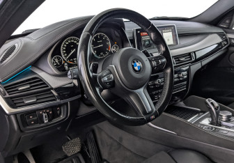 Подержанный автомобиль BMW X6 2018 года (15 фото)