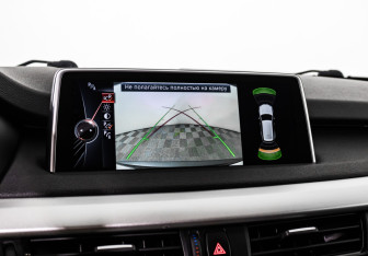 Подержанный автомобиль BMW X5 2015 года (13 фото)