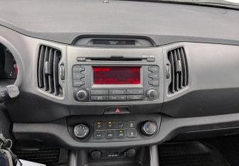 Подержанный автомобиль Kia Sportage 2012 года (15 фото)