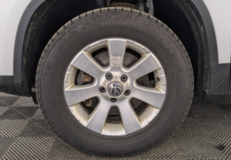 Подержанный автомобиль Volkswagen Tiguan 2013 года (12 фото)