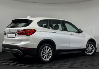 Подержанный автомобиль BMW X1 2016 года (2 фото)