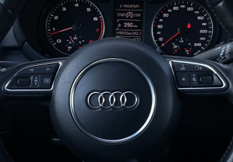 Подержанный автомобиль Audi A1 2013 года (14 фото)
