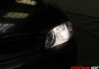 Подержанный автомобиль Kia Spectra Sedan 2006 года (15 фото)