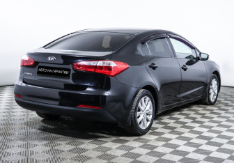 Подержанный автомобиль Kia Cerato Sedan 2015 года (3 фото)