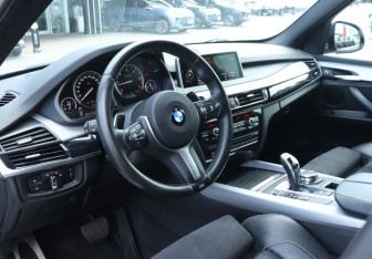 Подержанный автомобиль BMW X5 2015 года (13 фото)
