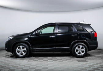 Подержанный автомобиль Kia Sorento 2013 года (8 фото)