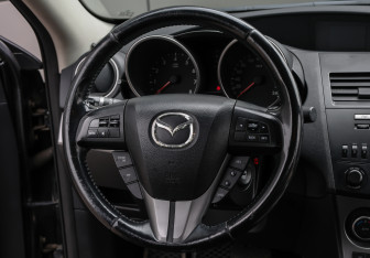 Подержанный автомобиль Mazda 3 Sedan 2009 года (14 фото)